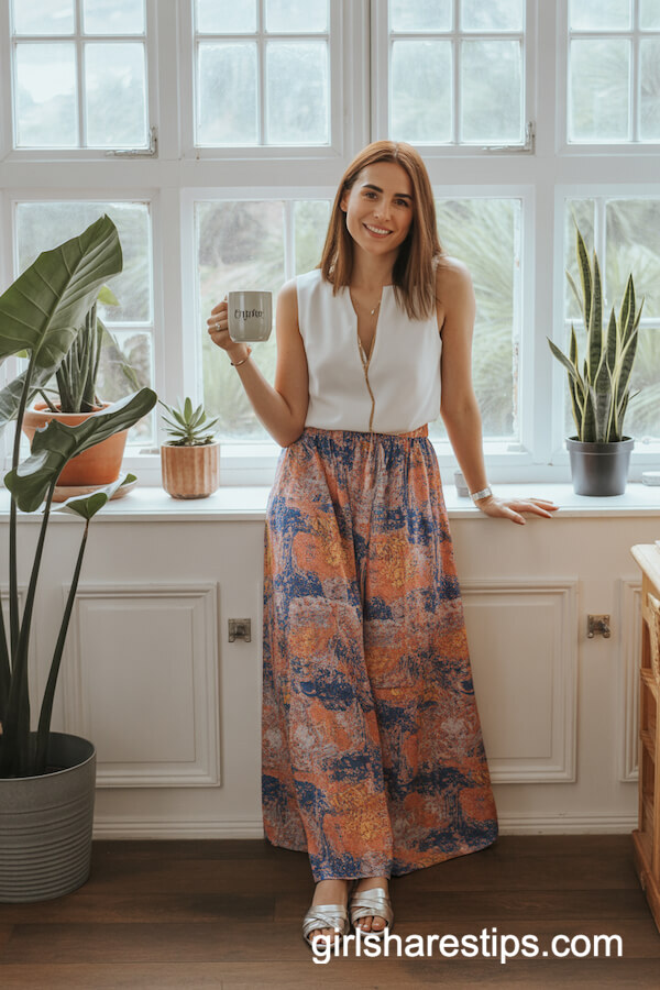 Sleeveless White Top with Colorful Printed Maxi Skirt