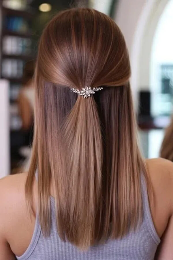 Half-Up Straight Hairstyle with Decorative Clip