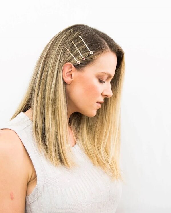 Sleek Side-Parted Hair with Hairpins