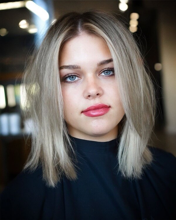 Platinum Medium Straight Hair with Clean Middle Part