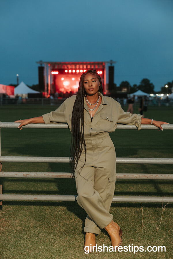 Modern Utility: Khaki Jumpsuit with Tan Western Boots and Layered Chains