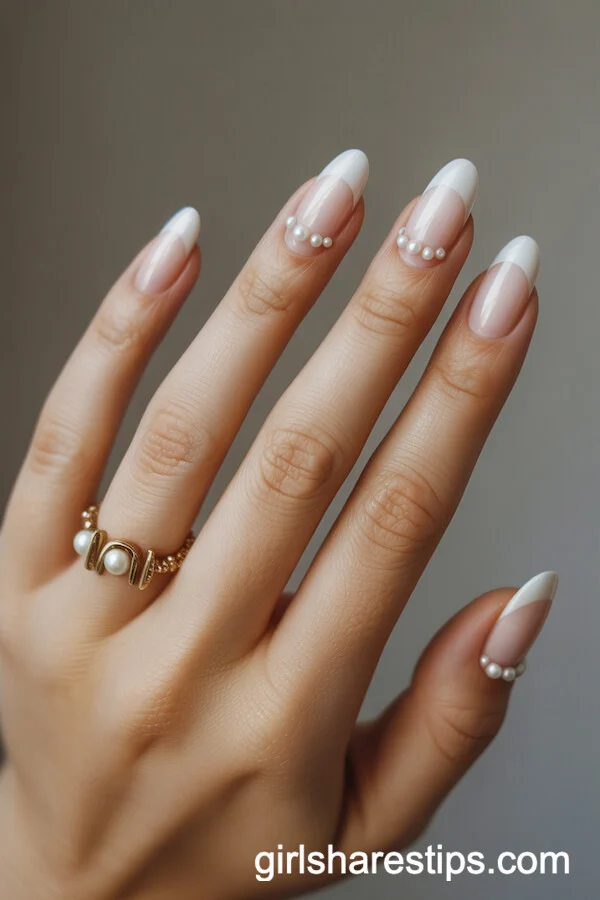 Milky Neutral Oval Nails with Tiny Pearl Accents