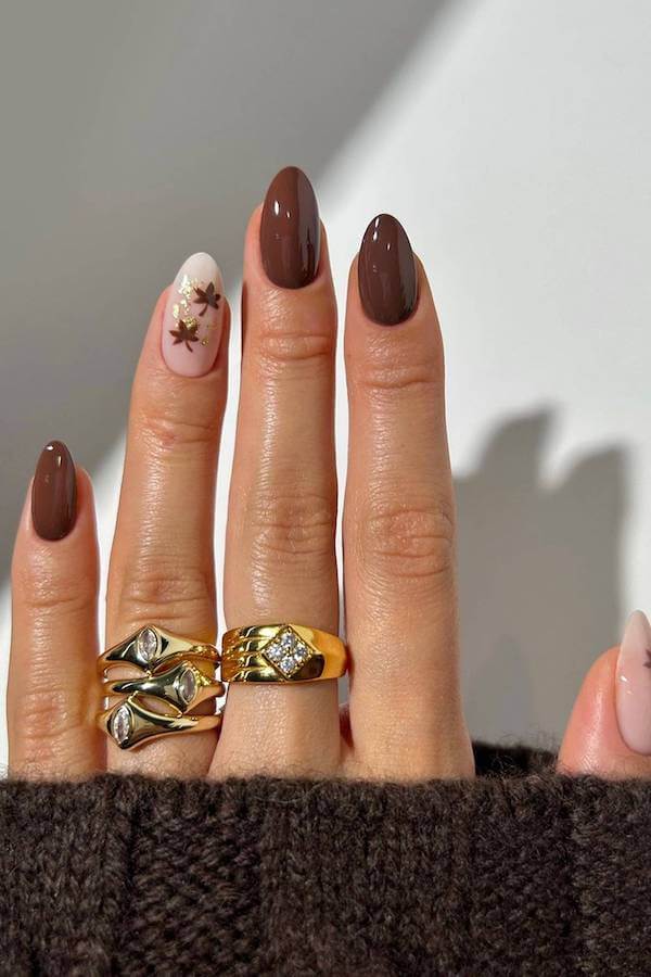 Brown Almond Nails with Leafy Floral Accent