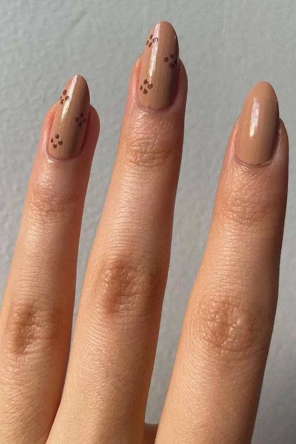 Minimalist Nude Nails with Tiny Brown Flowers