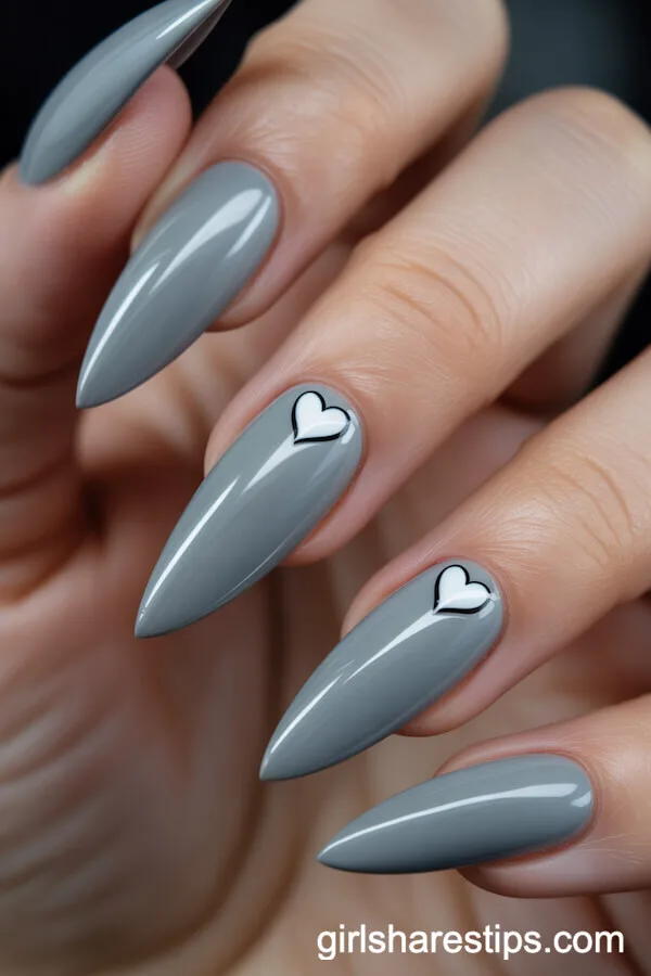Cement Gray Stiletto Nails with Raised White Heart Accents