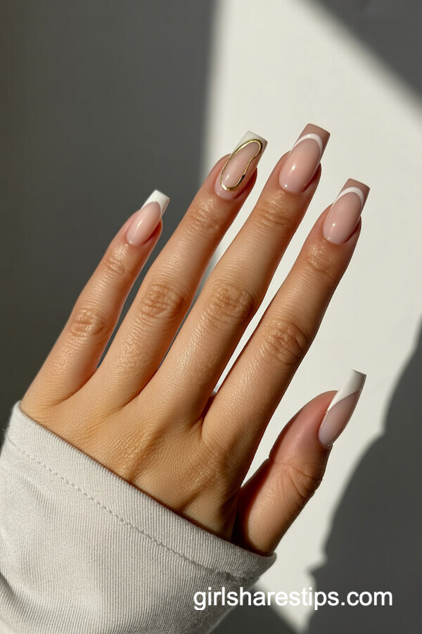 Sheer nude coffin nails with gold accent