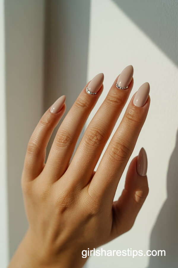 Matte sand almond nails with rhinestones