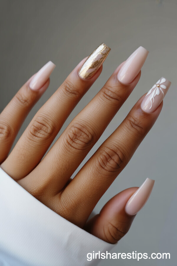Coffin Nude Nails with Gold Foil and White Floral Accents