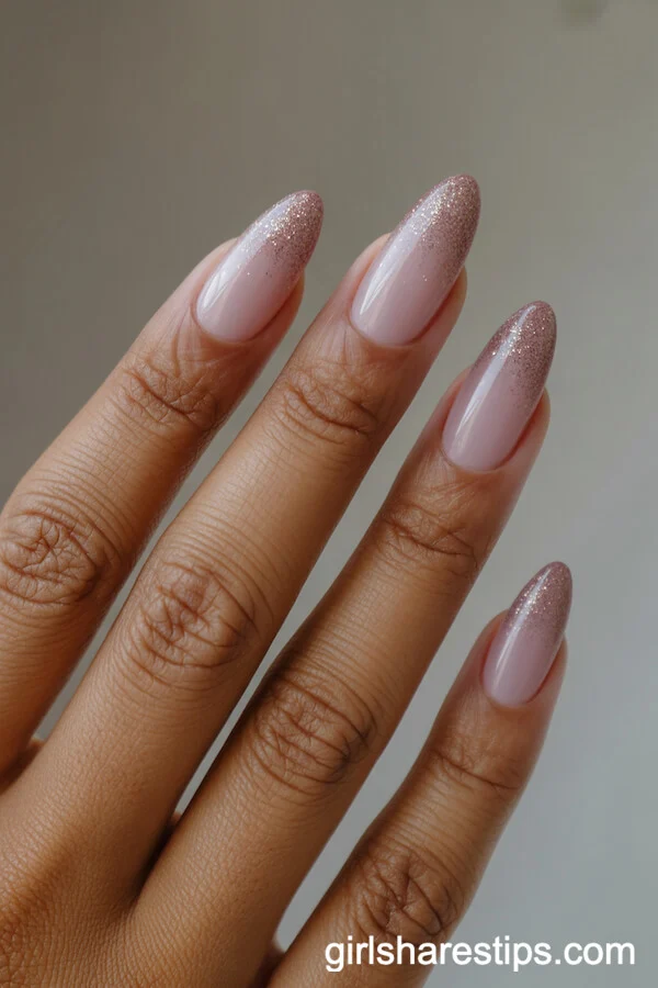 Soft Mauve Almond Nails with Glitter Ombr&eacute; Tips