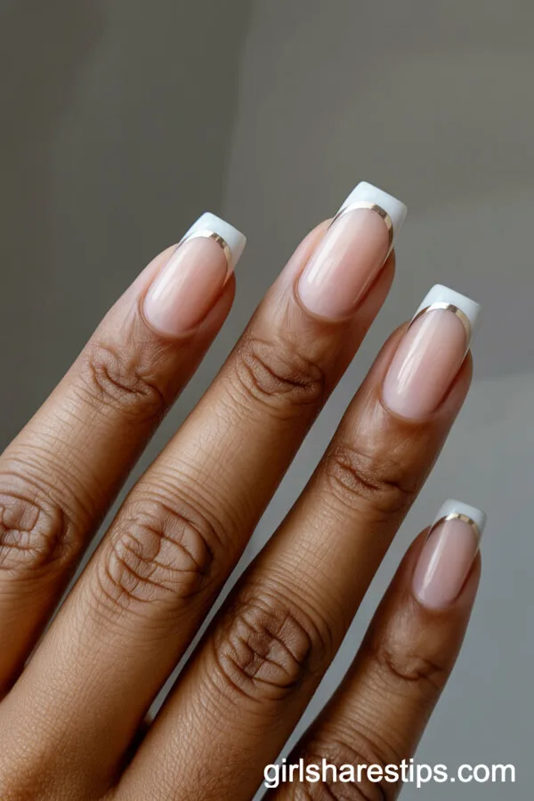 Beige Square Nails with Bold White French Tips and Gold Stripe