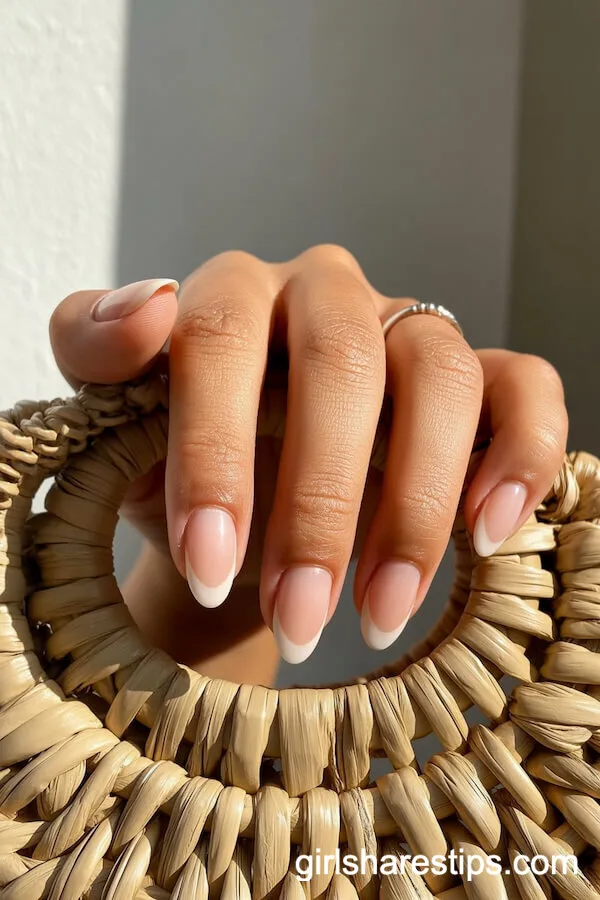 Warm Sand Nude Almond Nails with Cream Wavy Tips