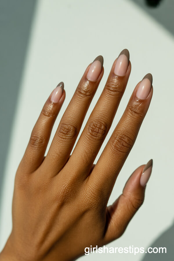 Ultra-Thin Taupe French Tips on Almond Nails