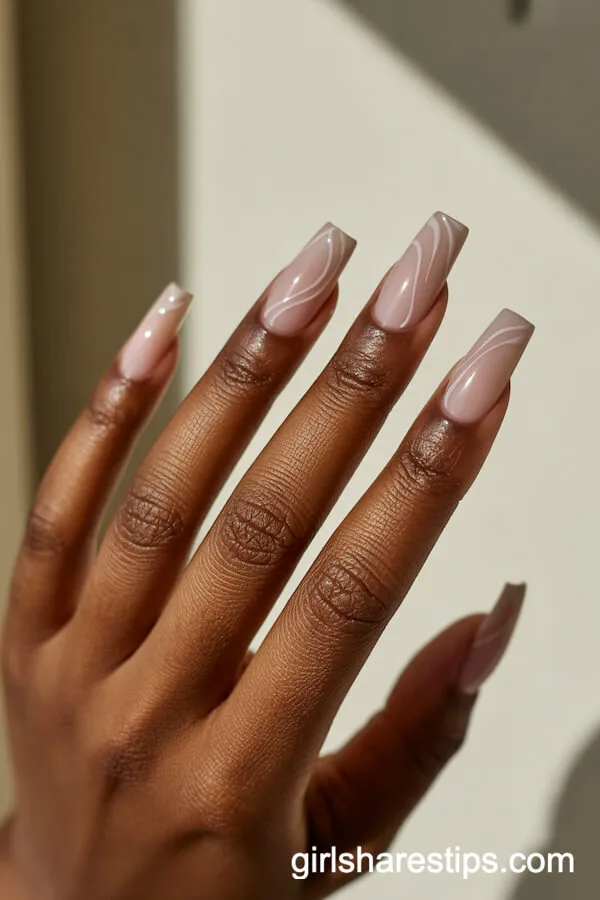 Taupe Base with White Swirl Art on Taper Coffin Nails