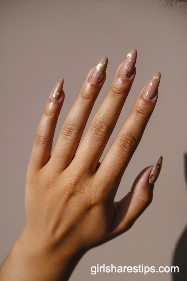 Warm Beige Stiletto Nails with Gold Foil Accents