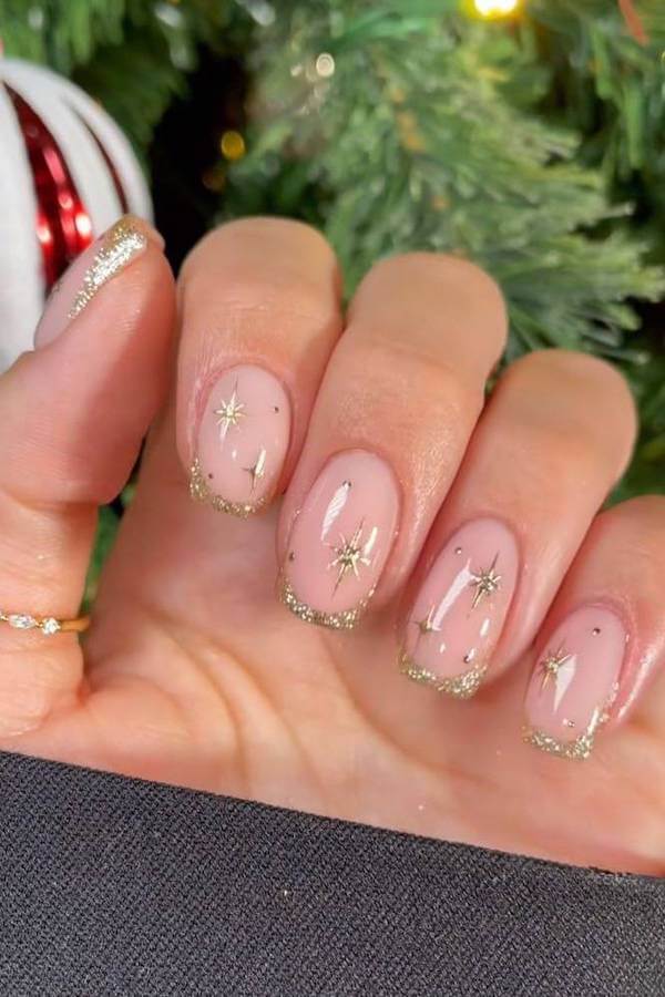 Nude Christmas Nails With Gold Star Accents