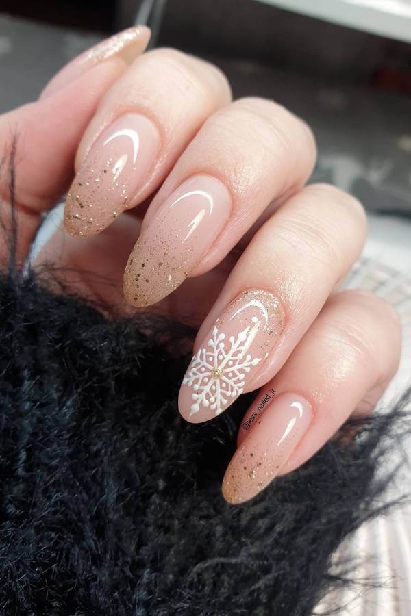 Nude Glitter Ombre Nails With Snowflake Accent