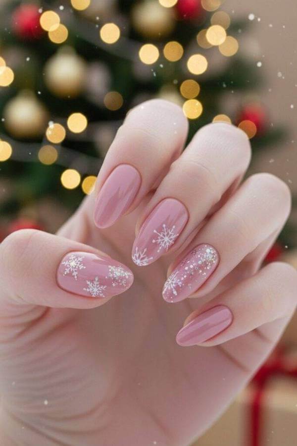 Nude Pink Nails With Snowflake Accents