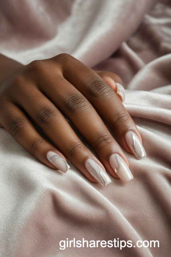 Nude Chrome Coffin Nails with Silver and Beige Marble Patterns