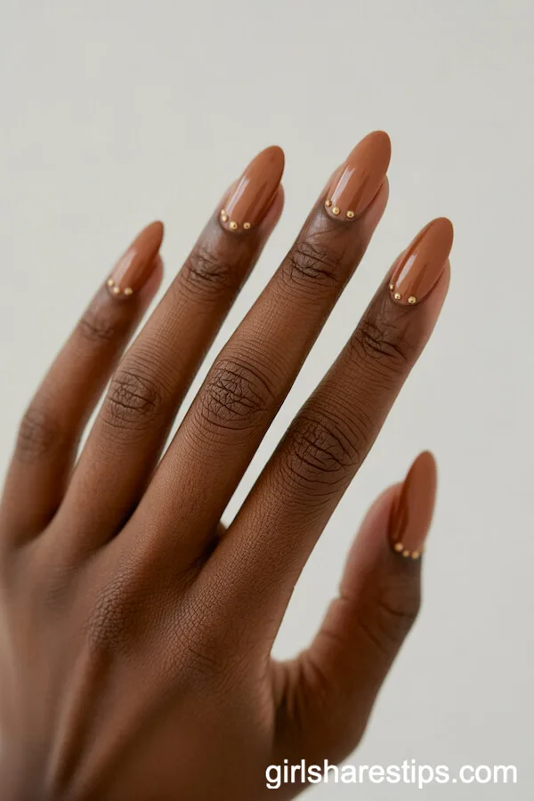 Long Oval Caramel Nails with Gold Dot Detailing