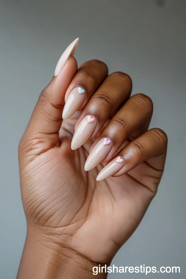 Long Stiletto Soft Beige Nude Nails with Pastel Heart Accents