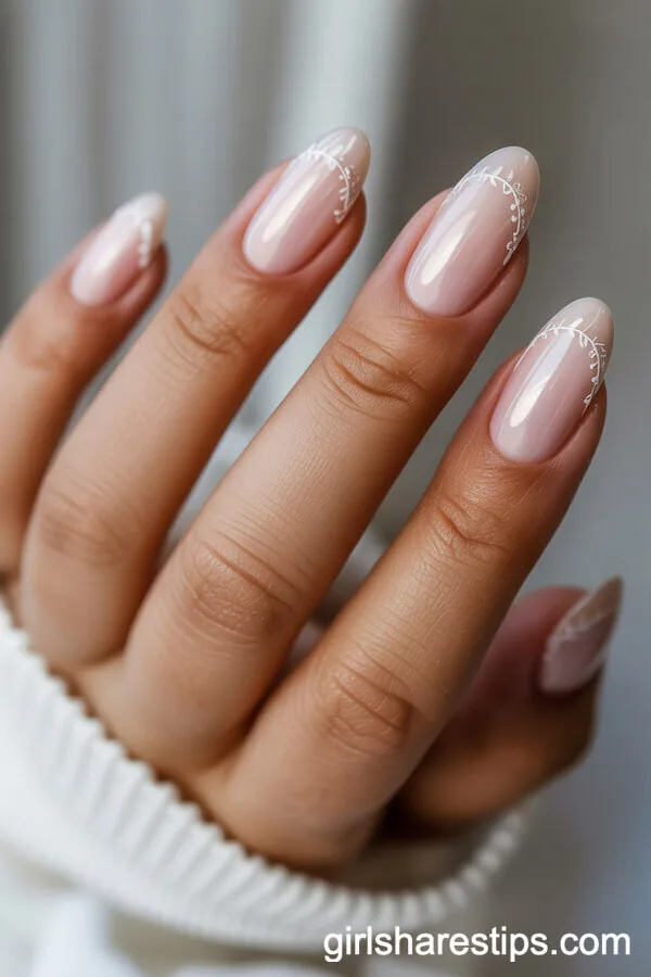 Oval Pearly Nude Nails with Lace-Inspired Edge Art