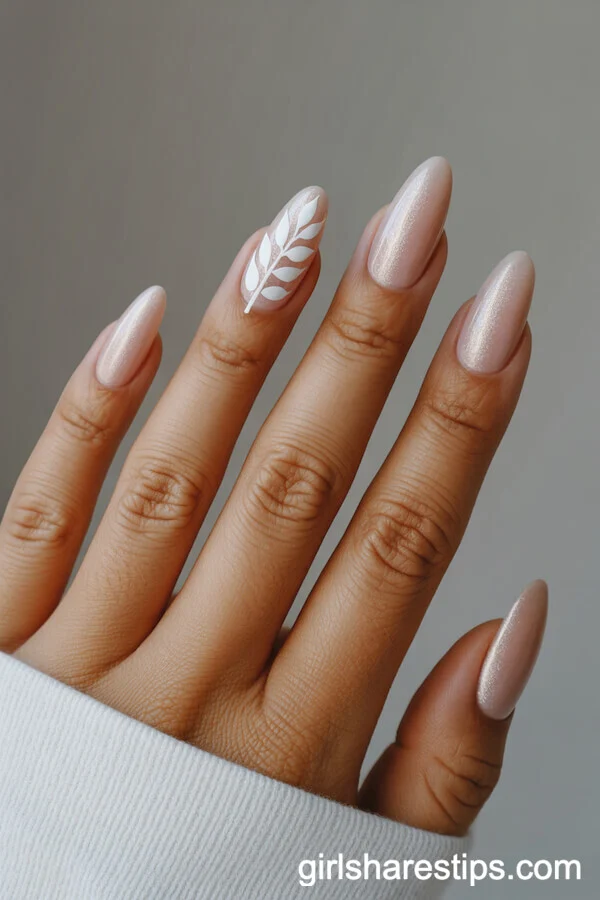 Shimmery Almond Nude Nails with Leafy White Branch Design
