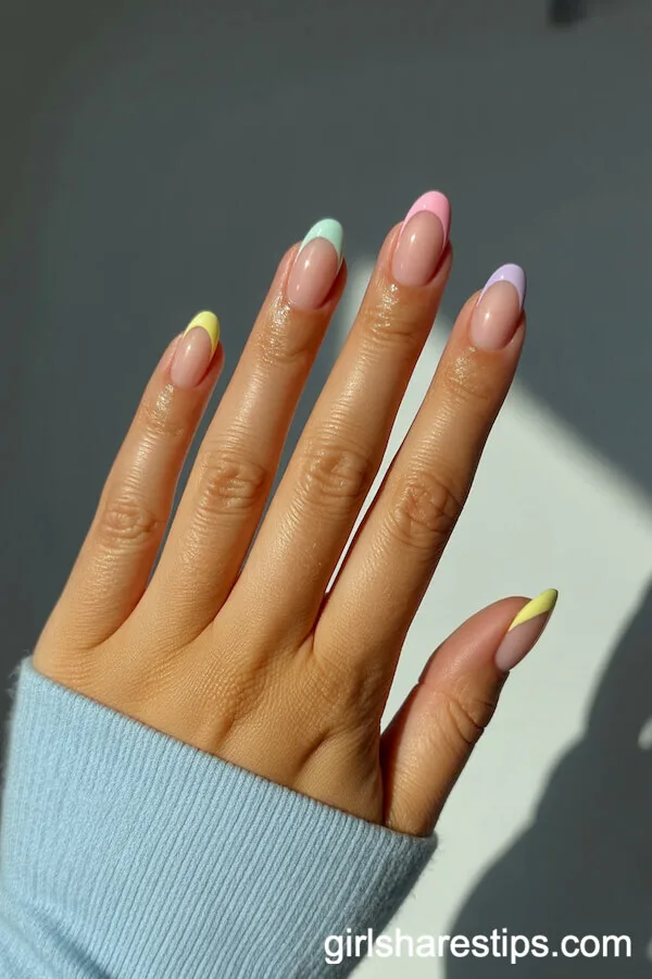 Glossy Oval Nude Nails with Pastel French Tips