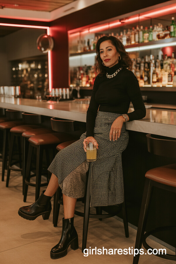 Fitted Black Turtleneck with Patterned Statement Skirt