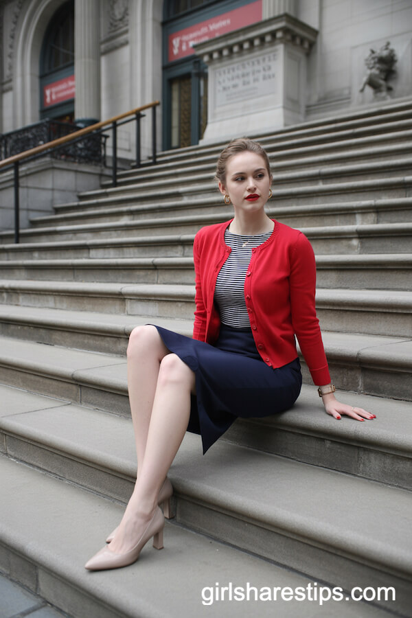 Navy Pencil Skirt with Striped Top and Red Cardigan for a Pop of Color at Work