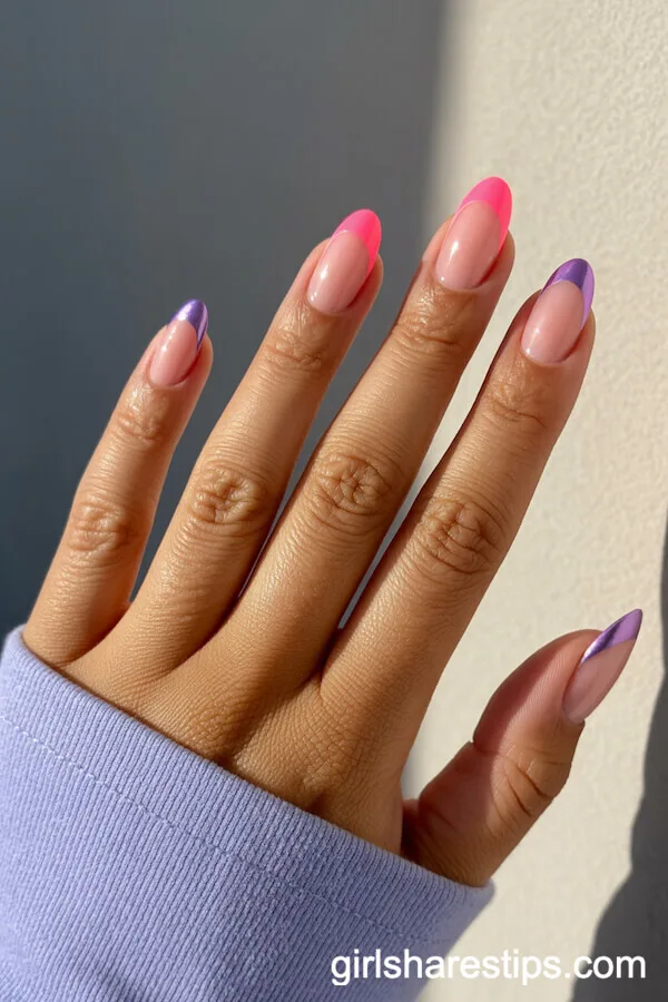 Nude Almond Nails with Neon Pink and Purple Chrome French Tips