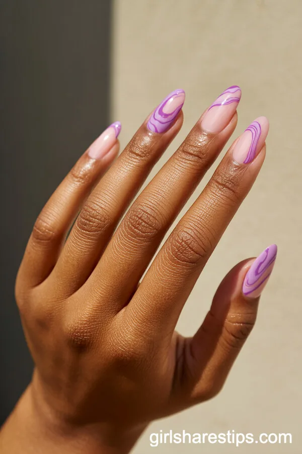 Pastel Pink Almond Nails with Purple Marble Swirls