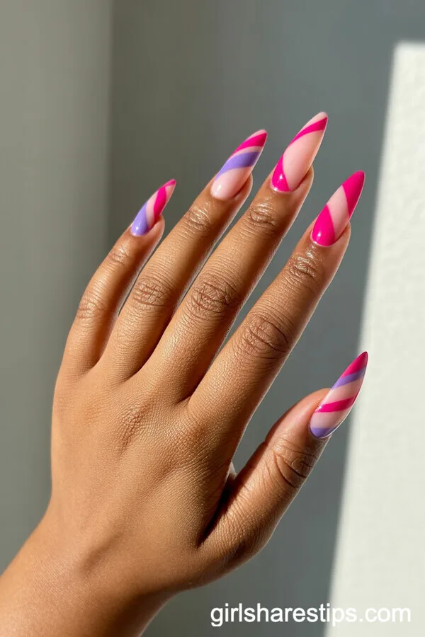 Geometric Pink and Purple Patterns on Stiletto Nails