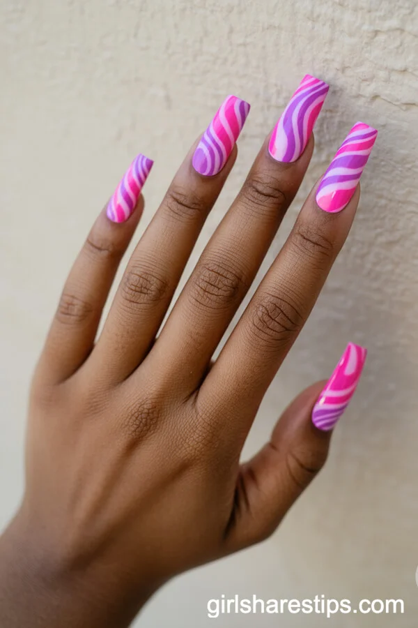 Tie-Dye Swirls on Long Pink and Purple Coffin Nails