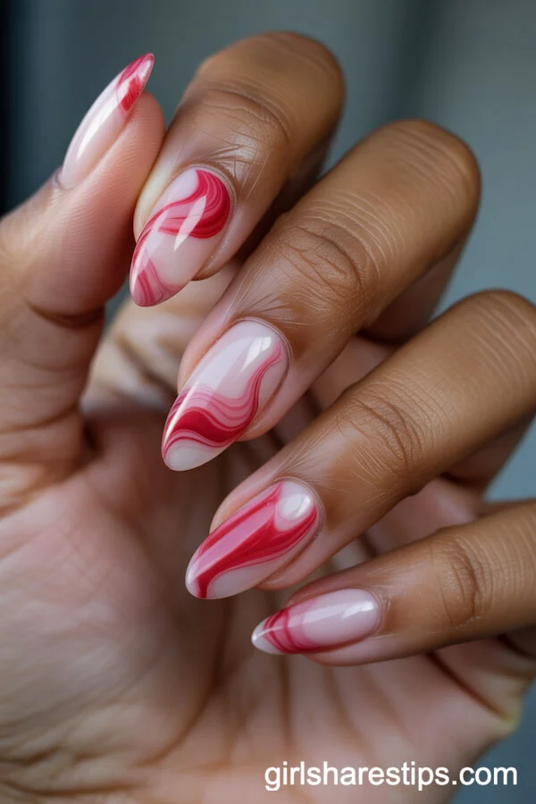 Pink and Red Veined Marble Almond Nails
