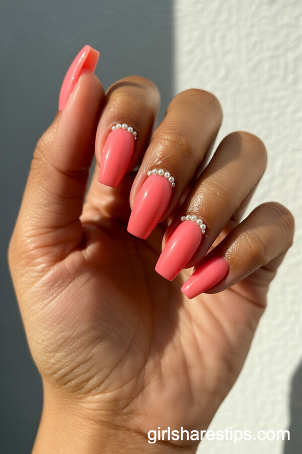 Watermelon Pink Coffin Nails with Pearl Embellishments