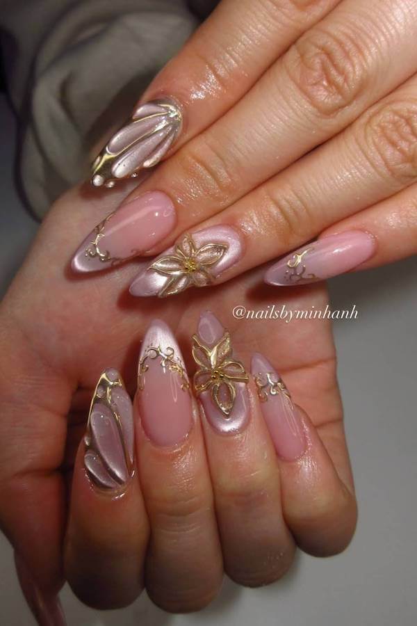 Pink Cat Eye Nails with Gold Floral Design