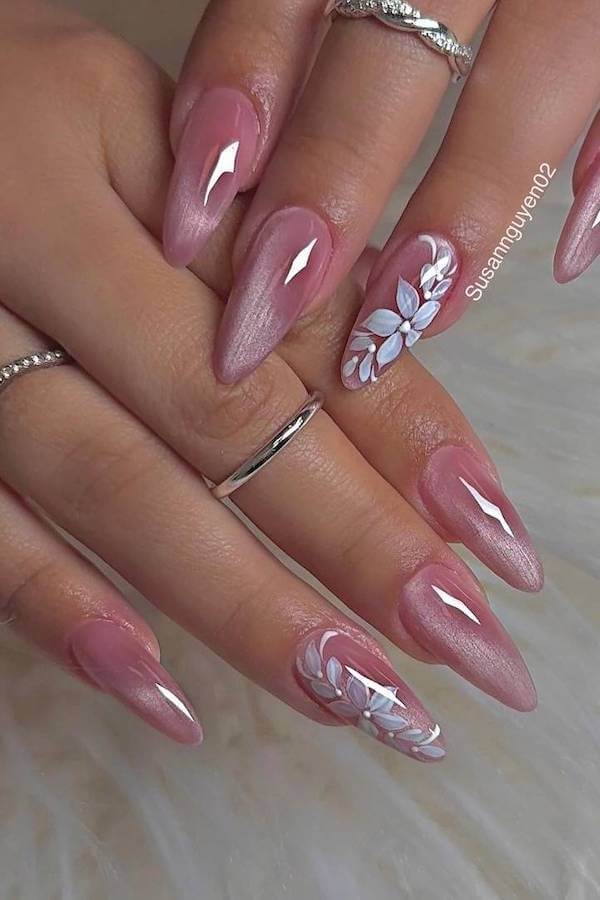 Pink Cat Eye Nails with White Floral Accent