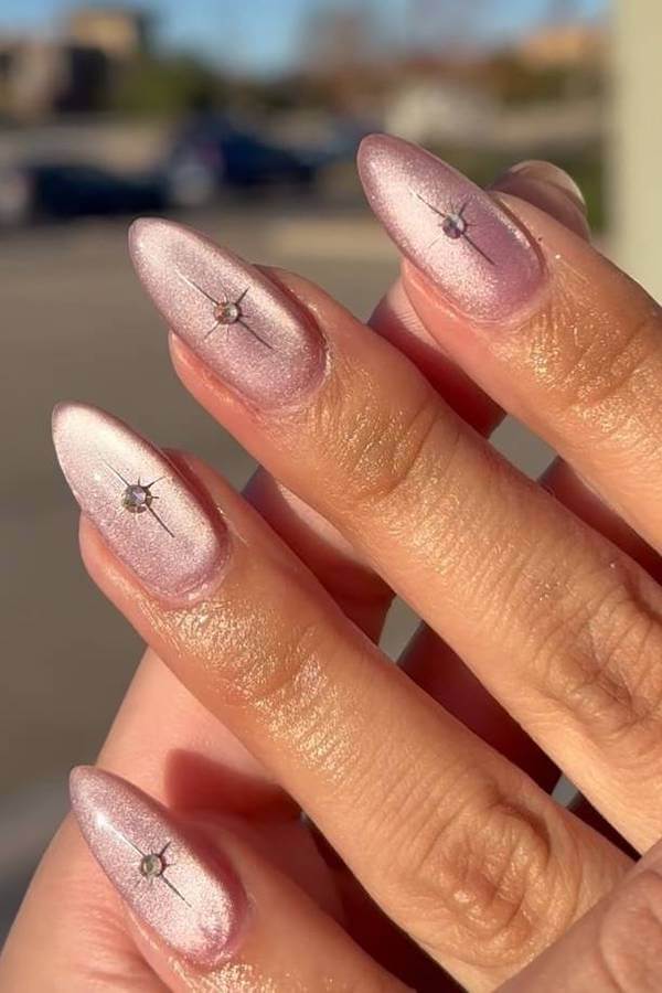Pink Cat Eye Nails with Rhinestone Accents