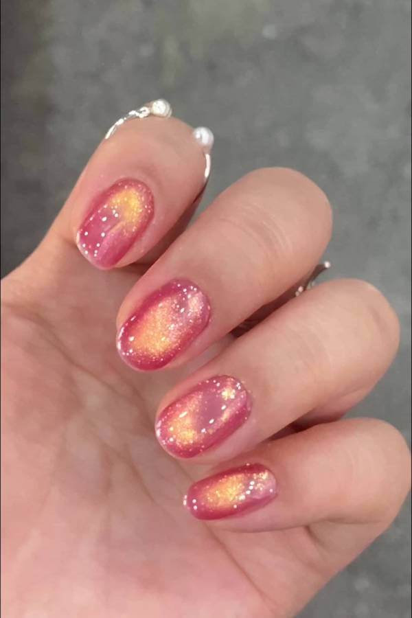 Sunset Glow Pink Cat Eye Nails