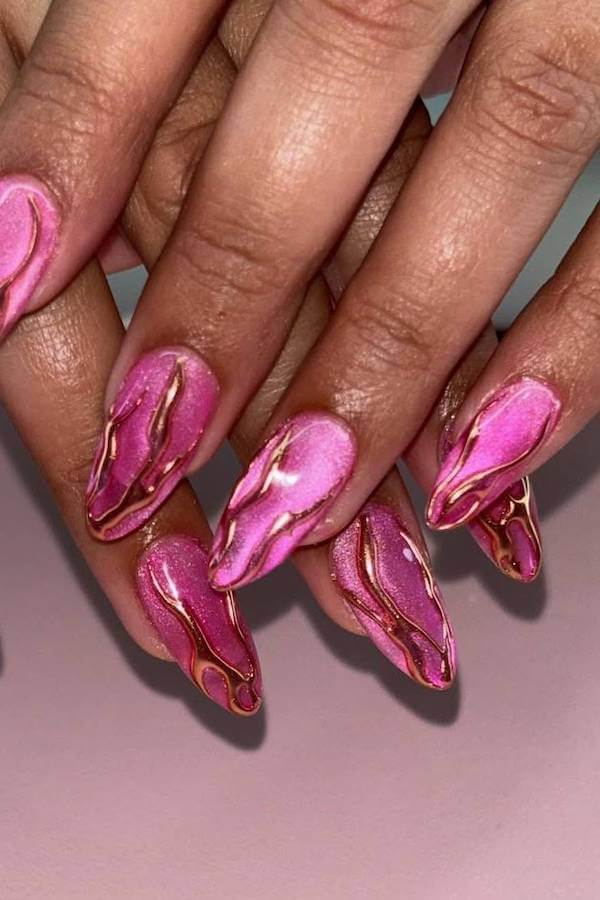 Pink Cat Eye Nails with 3D Metallic Swirls