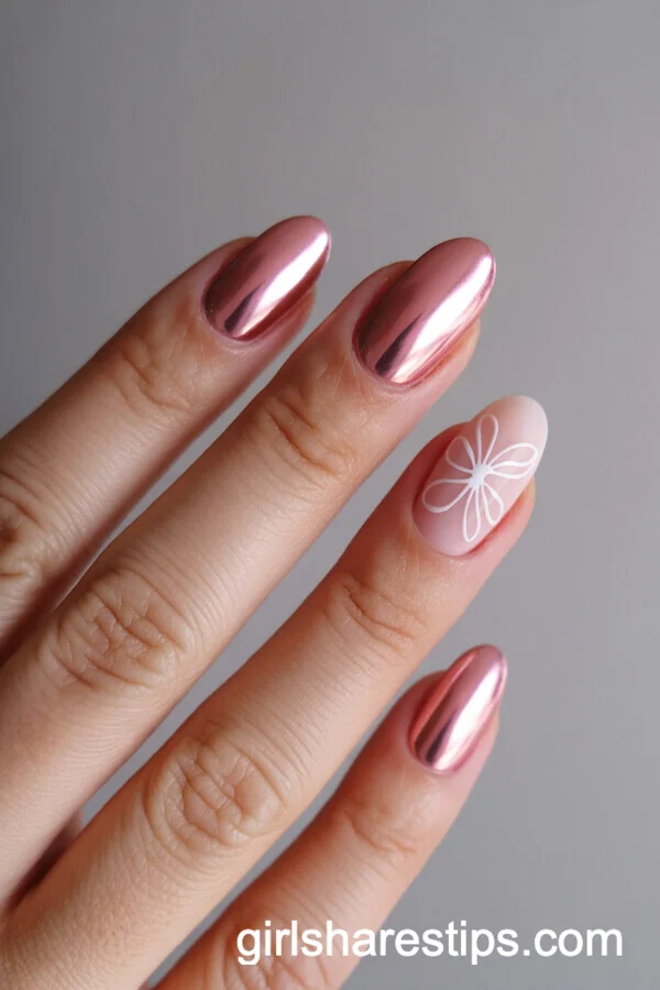 Oval Pink Chrome Nails with Minimalist White Floral Accent