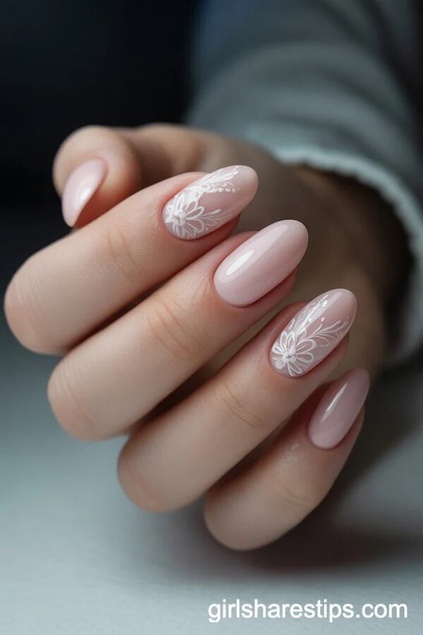 Soft Pink Oval Nails with Delicate White Lace Flowers