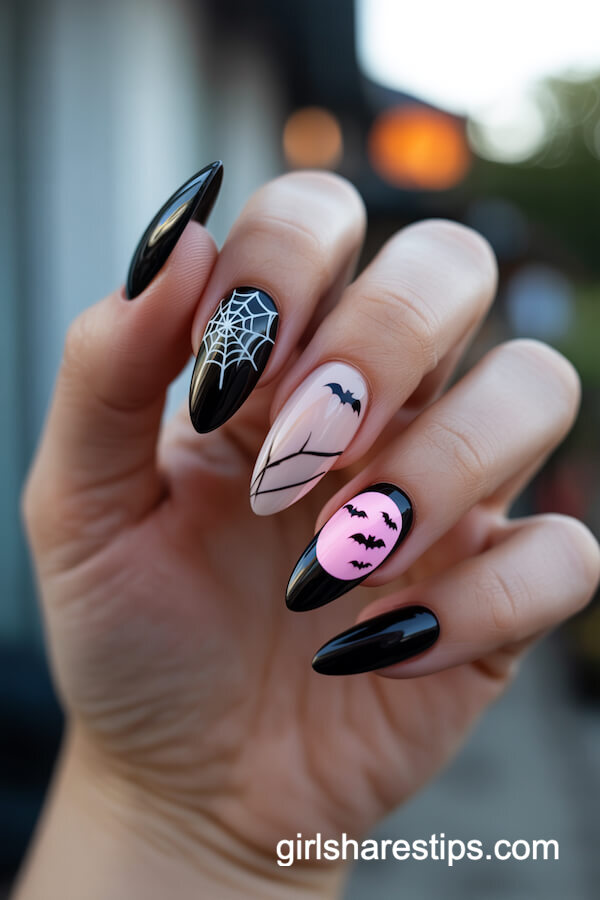 Alternating Black and Pink Almond Nails with Spiderwebs and Bats