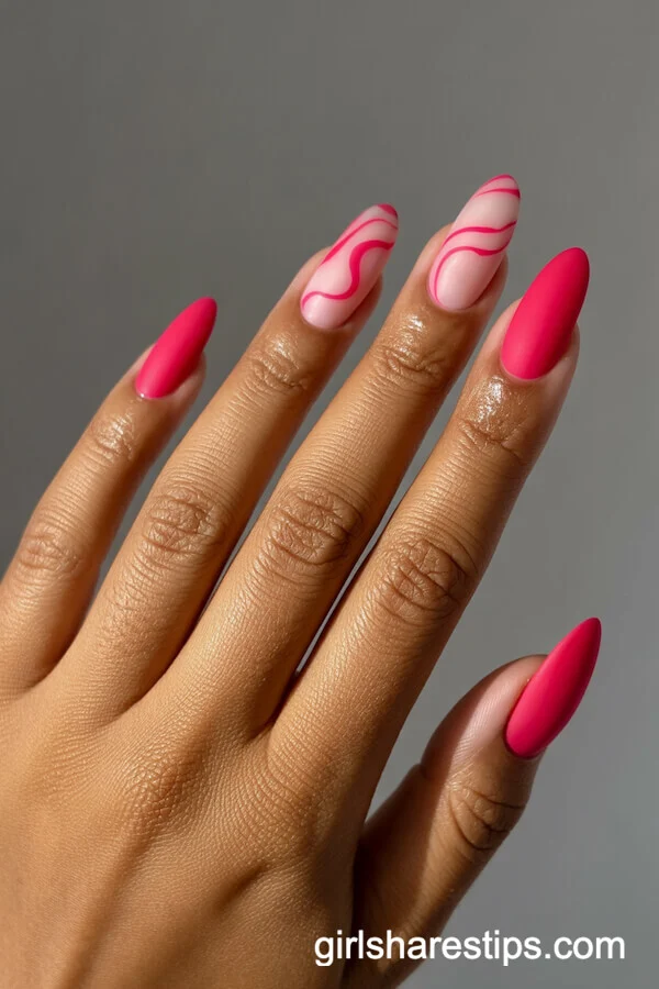 Hot Pink Matte Almond Nails With Glossy Swirl Patterns