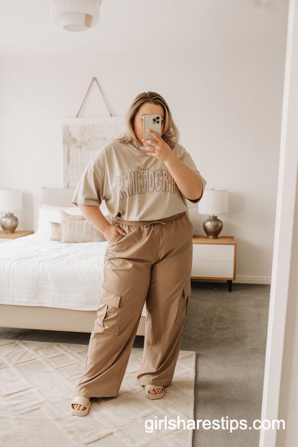 Casual Tan Cargo Pants and Graphic Tee Mirror Selfie