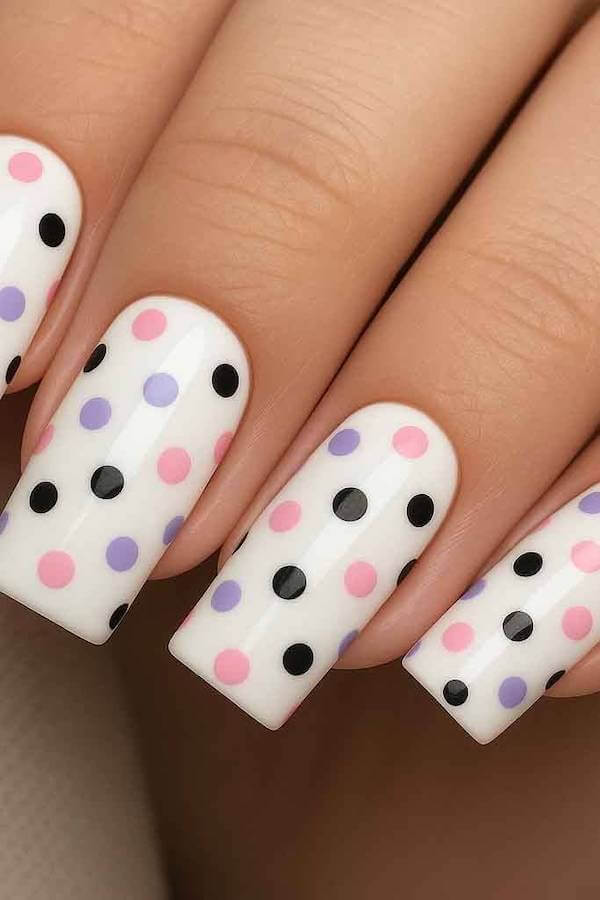 White Nails with Pink, Purple, and Black Polka Dots