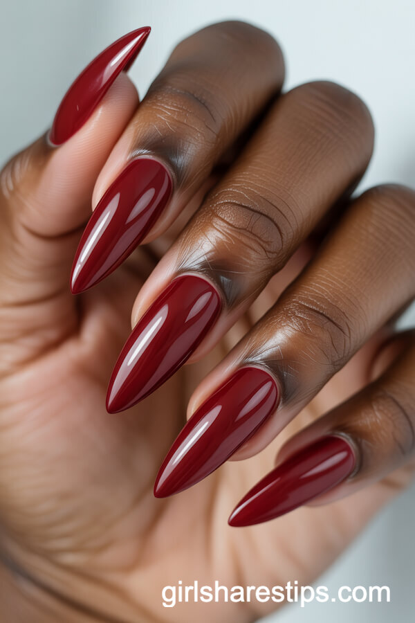Deep Red Stiletto Nails with High-Gloss Finish