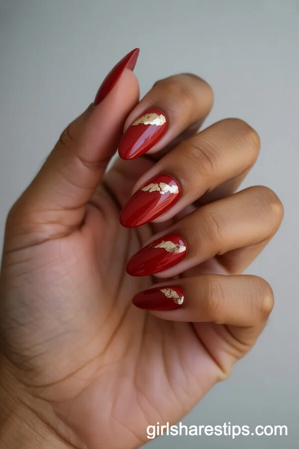 Almond Red Nails with Gold Foil Accents