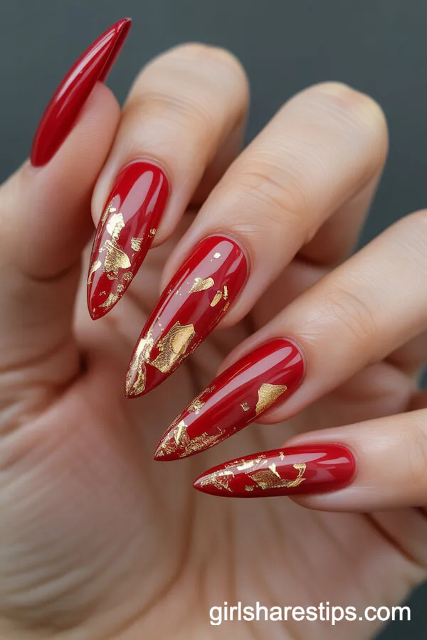 Ballerina Nails with Gold Foil Flakes on Glossy Red