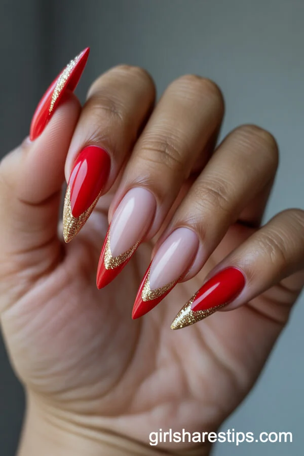 Stiletto Red Nails with Gold Glitter French Tips